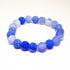 Blue Winterberry agate stone beaded bracelet featuring polished round beads in natural earth tones, stylish jewelry accessory.