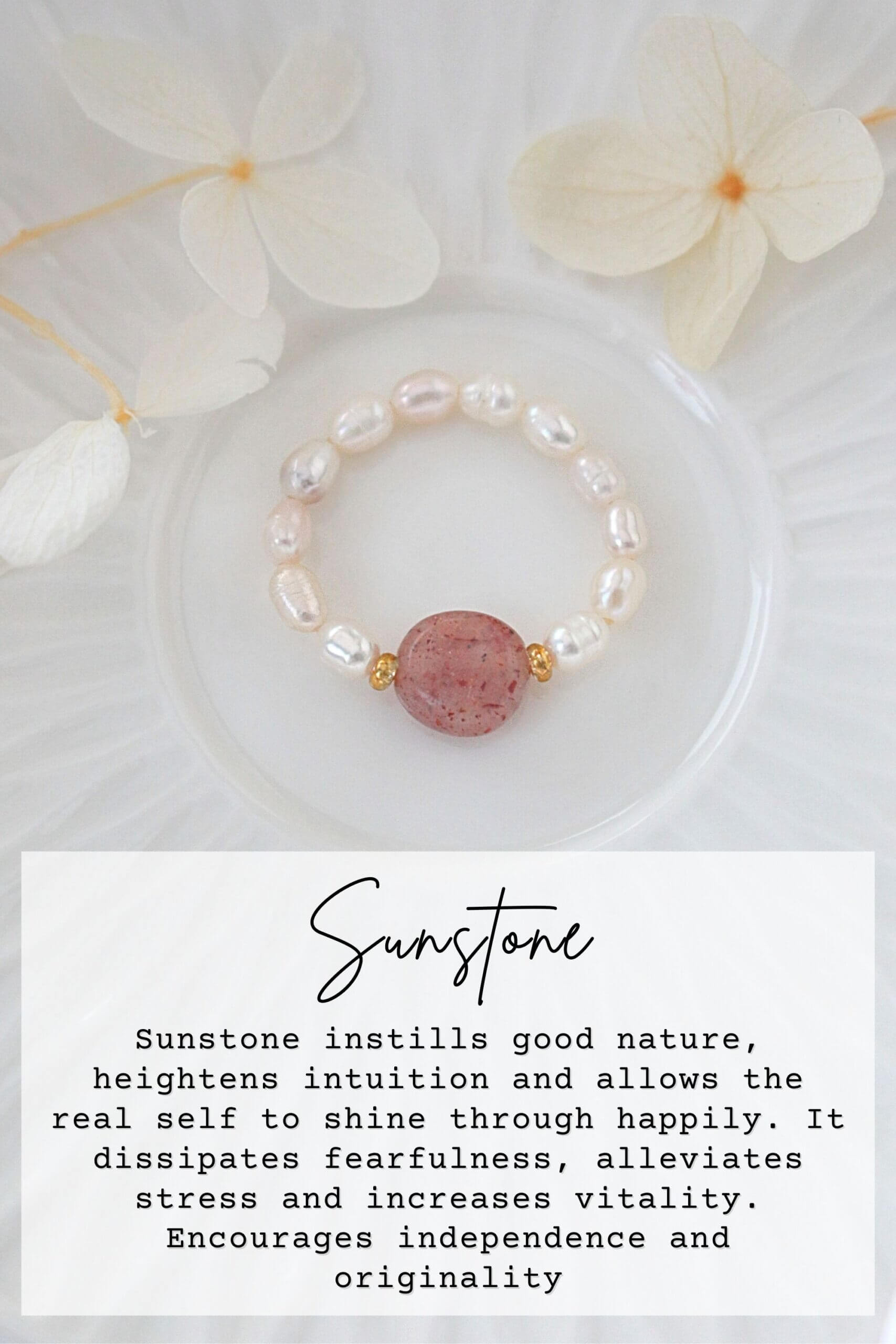Elastic rings by Ultramarine Birch featuring natural crystals and freshwater pearls, showcasing elegant, handcrafted jewelry.