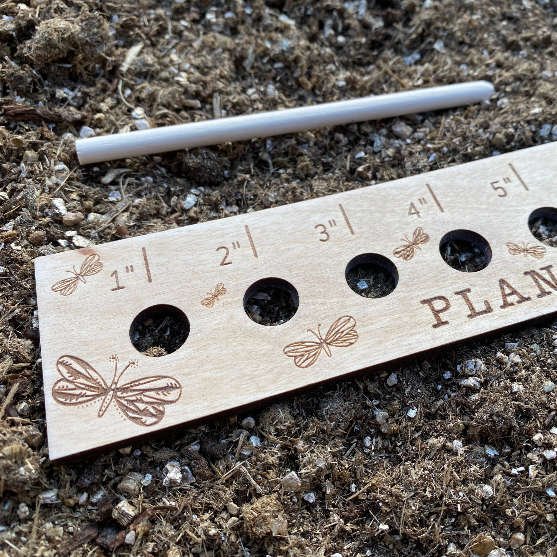 Cerise Almond Butterfly Garden Seed Spacing Ruler for precise plant spacing in garden planting and gardening projects.