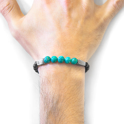 Blue turquoise Hukou silver and stone bracelet with intricate details, crafted by Magenta Sooty, featuring vibrant blue and silver accents.