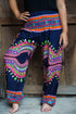 Tan Smokey tribal harem pants with boho style, featuring a relaxed fit, vibrant patterns, and lightweight fabric.