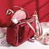 Large capacity Maroon Chronos diaper backpack for kids and babies, with multiple compartments and adjustable straps.