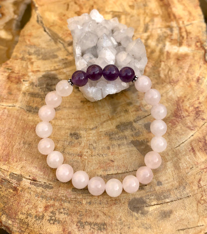 Rose Quartz and Amethyst stretch bracelet featuring natural crystals from Violet Chaos, showcasing colorful gemstone beads.