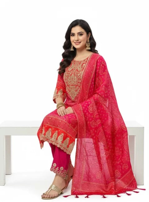 Pink and red Bandhej suit set with matching dupatta for women, featuring traditional Indian design by Viridian Caeneus.