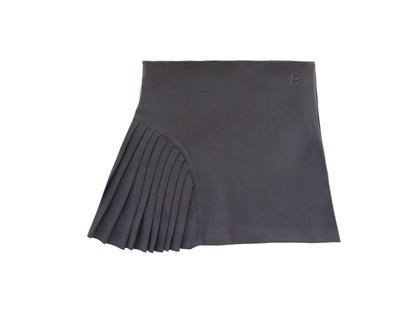 Emerald Hephaestus half-pleated mini skirt in black, showcasing its stylish design and lightweight fabric.