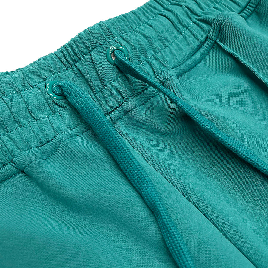 Lime Milo flare stacked track suit with matching jacket and pants, activewear set featuring stylish flare design and comfortable fit.