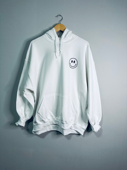 White hoodie from Emerald Ourea with "Dear Person Behind Me" text, casual sweater hoodie with front pocket and drawstrings.