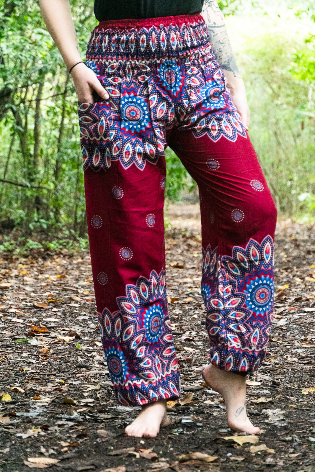 Burgundy floral mandala boho pants for women by Tan Smokey, featuring a relaxed fit and vibrant floral design for yoga and casual wear.