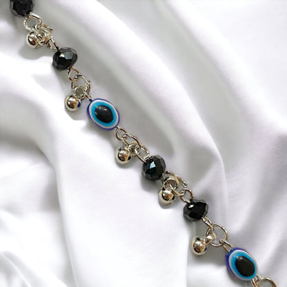 Gray Poseidon Fortune’s Shield Evil Eye bracelet featuring a protective blue and silver jewelry piece with intricate design detailing.