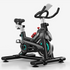 Lilac Milo indoor stationary exercise cycling bike for home use, with adjustable seat and handlebars, black and silver design.