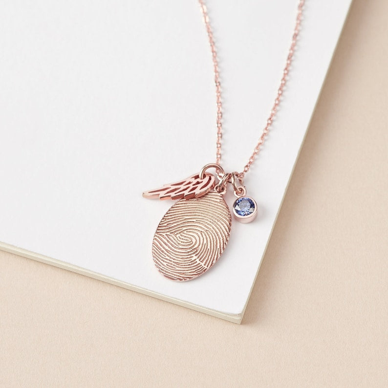 Green Millie fingerprint necklace featuring personalized fingerprint jewelry with a sparkling birthstone pendant.