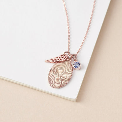 Green Millie fingerprint necklace featuring personalized fingerprint jewelry with a sparkling birthstone pendant.