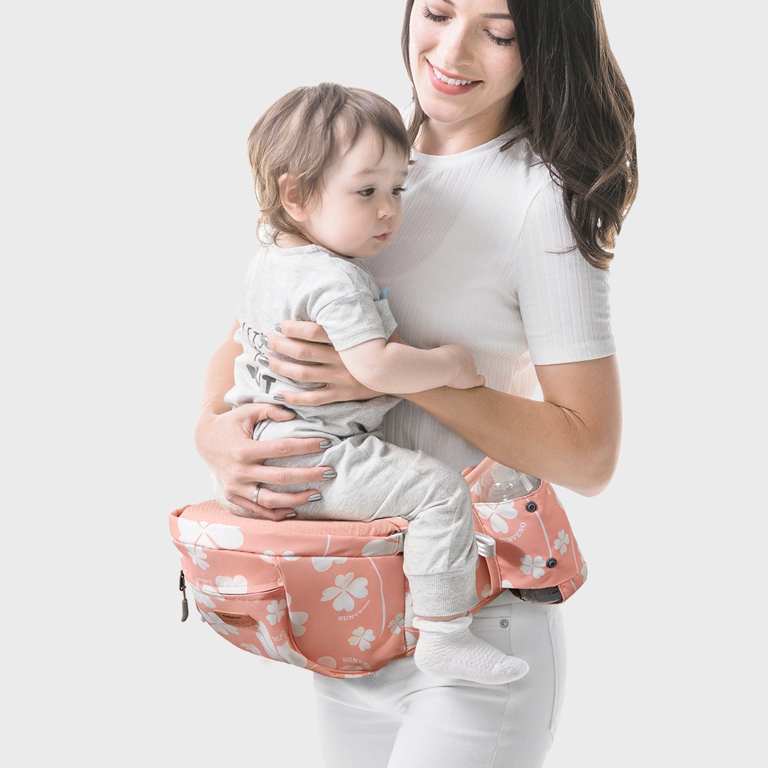 Maroon Chronos ergonomic hip seat with cushion, designed for parenthood and accessories, showing a comfortable padded seat in neutral colors.