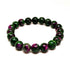 Red sapphire beaded bracelet by Blue Winterberry featuring polished red sapphires on a delicate jewelry chain.