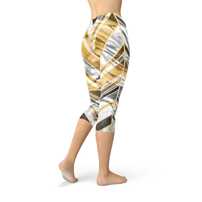 White marble and black gold lines Capri leggings by Maroon Sooty, showcasing a stylish marble pattern and slim fit.