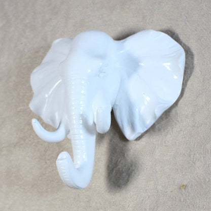 Fuchsia Molly resin elephant head hook for home and garden decor, featuring a detailed elephant design in natural finish.