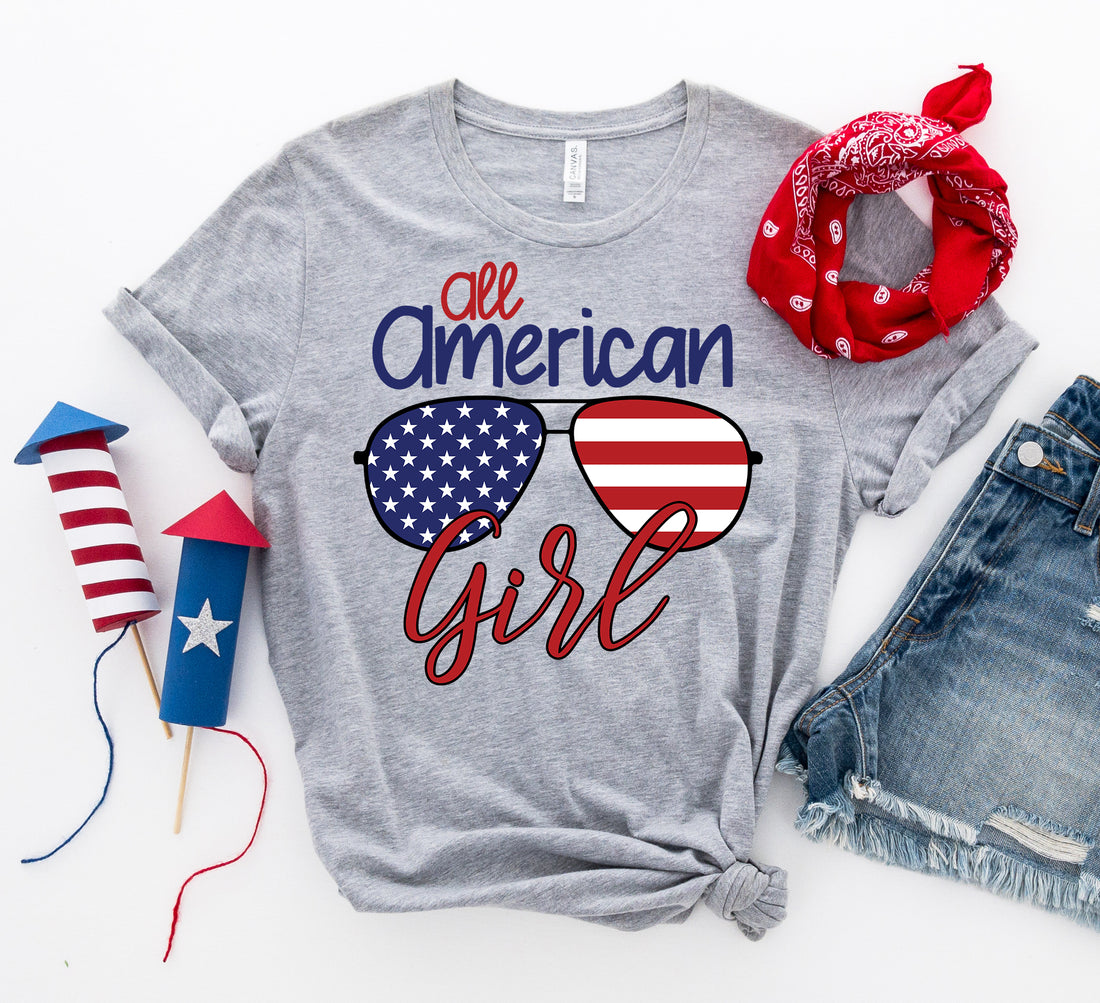 All American Girl T-shirt by Agate featuring a casual fit and patriotic design, displayed on a hanger.