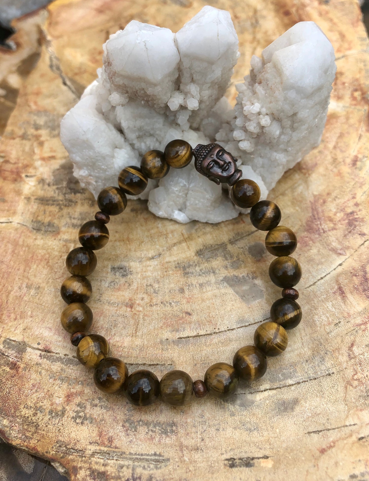 Violet Chaos Tiger Eye and Buddha gemstone bracelet with polished beads, natural gemstones, and spiritual charm design.