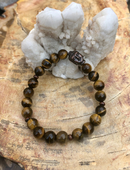 Violet Chaos Tiger Eye and Buddha gemstone bracelet with polished beads, natural gemstones, and spiritual charm design.
