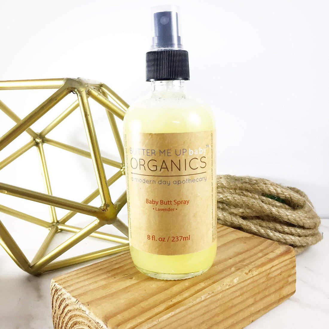 White Smokey baby butt spray for diaper changing, featuring a spray bottle with gentle bodycare formula for sensitive skin.