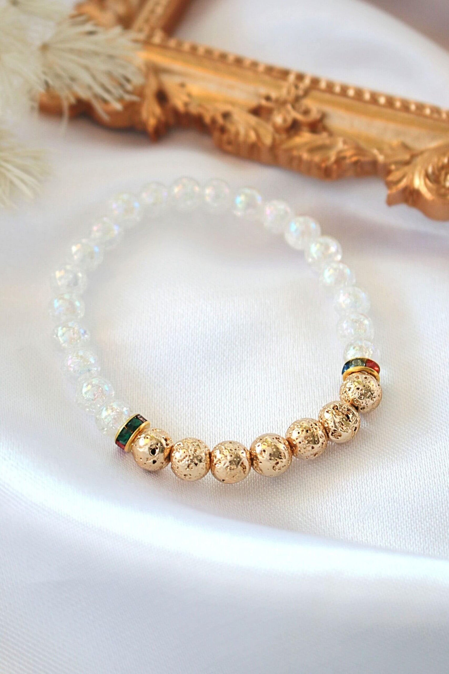 Golden lava stone elastic bracelet with aroma diffuser beads, featuring a sleek design by Ultramarine Birch.