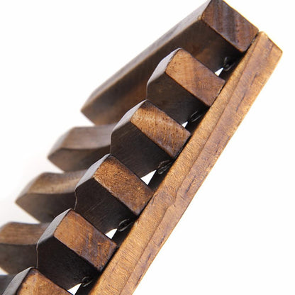 Black Oliver wooden soap dish for bodycare, featuring smooth polished wood with drainage slats for soap drying.