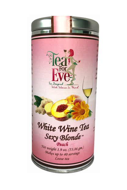 Violet Strawberry White Wine Infused Peach Tea in a clear glass cup, showcasing the tea&