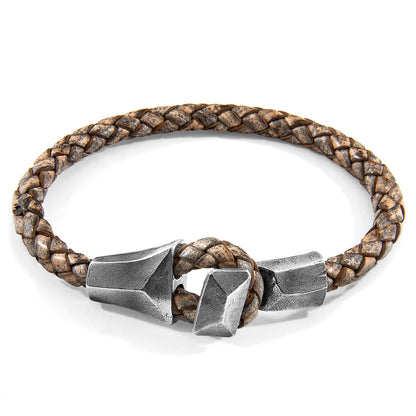 Taupe grey Alderney silver and braided leather bracelet by Magenta Sooty, featuring silver accents and intricate leather weaving.