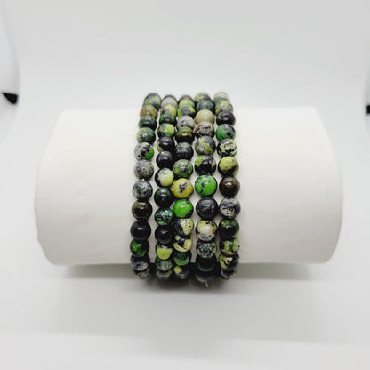 Green Chrysoprase stone bracelet by Olive Coeus featuring a boho style, ideal for metaphysical and Reiki energy healing.