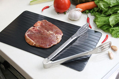 Yellow Pandora fast defrosting food tray for meat and seafood, kitchen tool for quick thawing of frozen items.