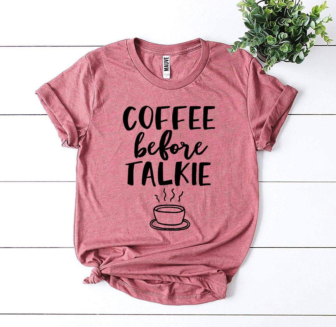 Agate Coffee Before Talkie T-shirt displayed flat, featuring black fabric with white text, casual short-sleeve unisex T-shirt.