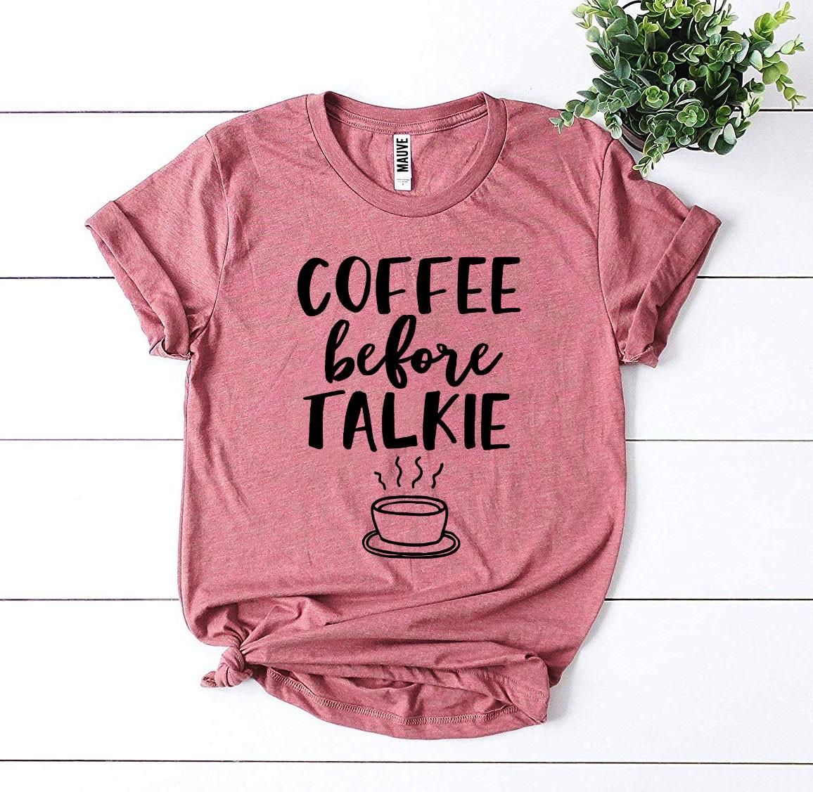 Agate Coffee Before Talkie T-shirt displayed flat, featuring black fabric with white text, casual short-sleeve unisex T-shirt.