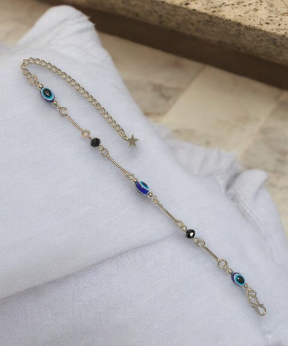 Gray Poseidon Fortune’s Shield Evil Eye bracelet featuring a silver-tone jewelry design with protective evil eye charm.