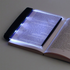 Lilac Milo portable LED tablet book light for reading as a night light, compact tech accessory with adjustable brightness.