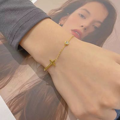 Byzantium Metis faith-based cross bracelet with delicate chain and religious charm, suitable as a bracelet or anklet.