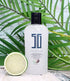 Sky Blue Lucy Coconut Lime hand sanitizer bottle for bath and beauty, featuring a sleek design and vibrant label.