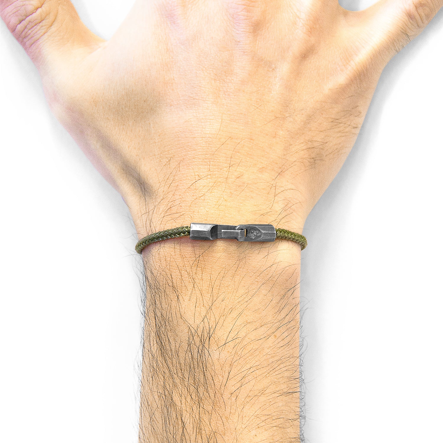 Khaki green Talbot silver and rope bracelet by Magenta Sooty with intricate silver accents and braided rope design.