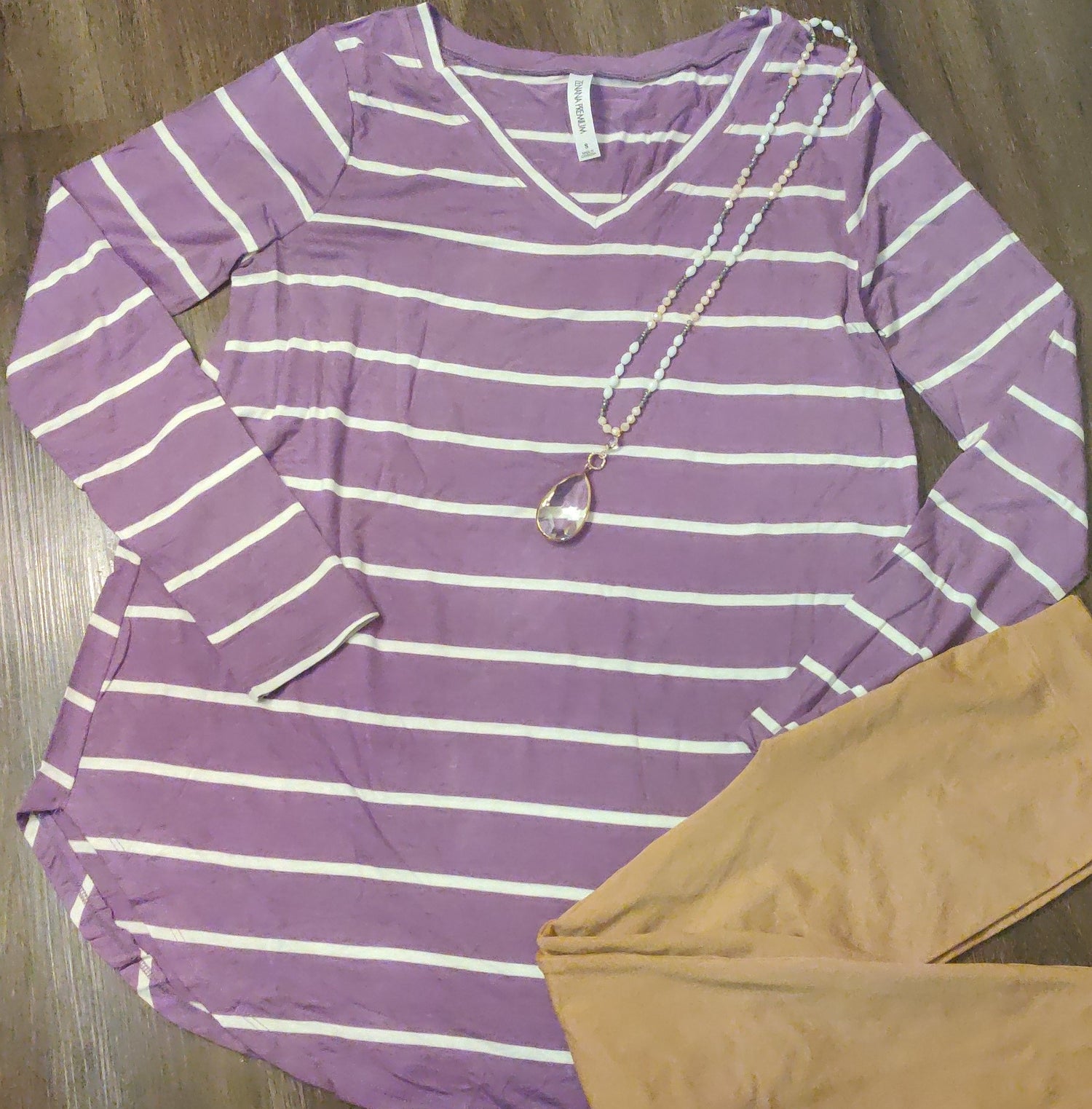 Ochre Ismene knit striped tunic for women, featuring a cozy, stylish design perfect for casual or layered outfits.
