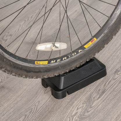 Indoor magnetic bike trainer stand by Taupe Shadow with 5 resistance levels, suited for indoor cycling and bike training.