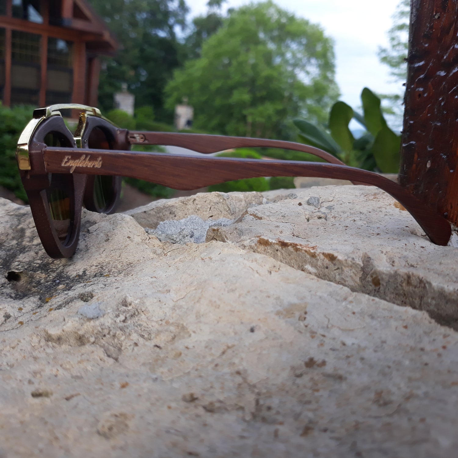 Purple Ariadne cherry wood full frame sunglasses with polarized lenses and gold trim, handcrafted for a stylish look.