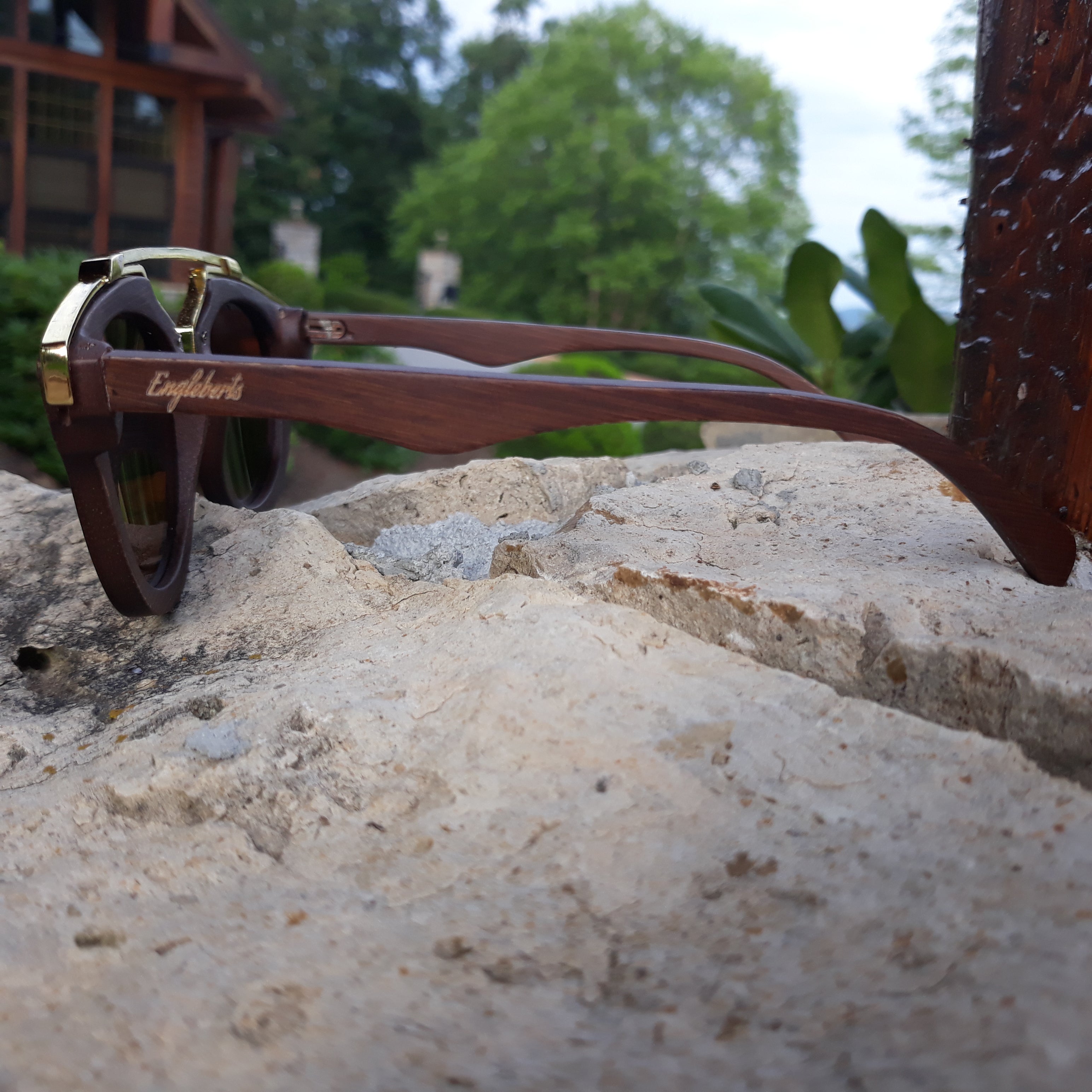 Purple Ariadne cherry wood full frame sunglasses with polarized lenses and gold trim, handcrafted for a stylish look.