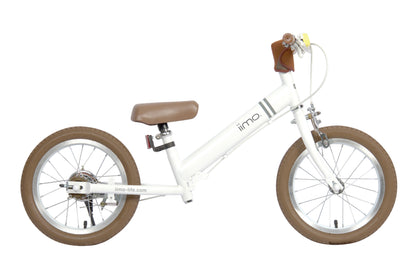 Purple Phaedra iimo 2-in-1 14-inch balance and pedal bike for kids, featuring a sturdy frame and adjustable handlebars for young riders.