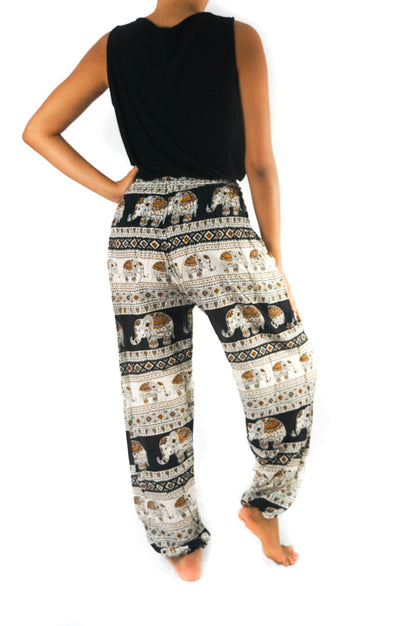 Black Elephant print boho pants for women by Tan Smokey, featuring a relaxed fit, hippie style, and comfortable yoga-inspired design.