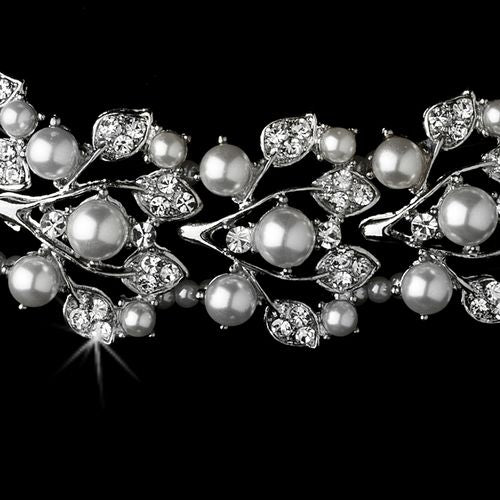 Elegant bridal wedding jewelry set featuring crystal, pearl necklace and earrings by Olive Chaos, perfect for special occasions.