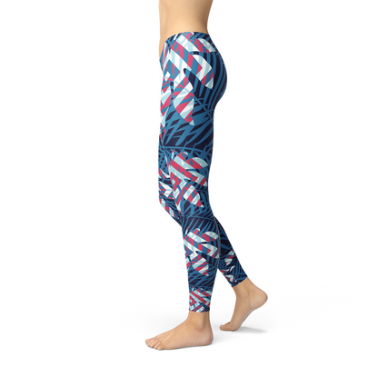 Maroon Sooty blue tropical leaf leggings for women, featuring vibrant leaf print and comfortable stretchy fabric.