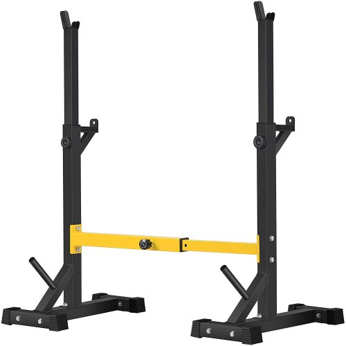 Teal Simba squat rack stand with barbell, free press bench, and dumbbell racks in a home gym setting.