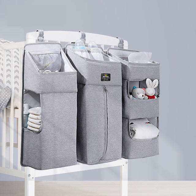 Maroon Chronos baby diaper caddy with dividers, designed for organizing baby essentials in a nursery or diaper changing area
