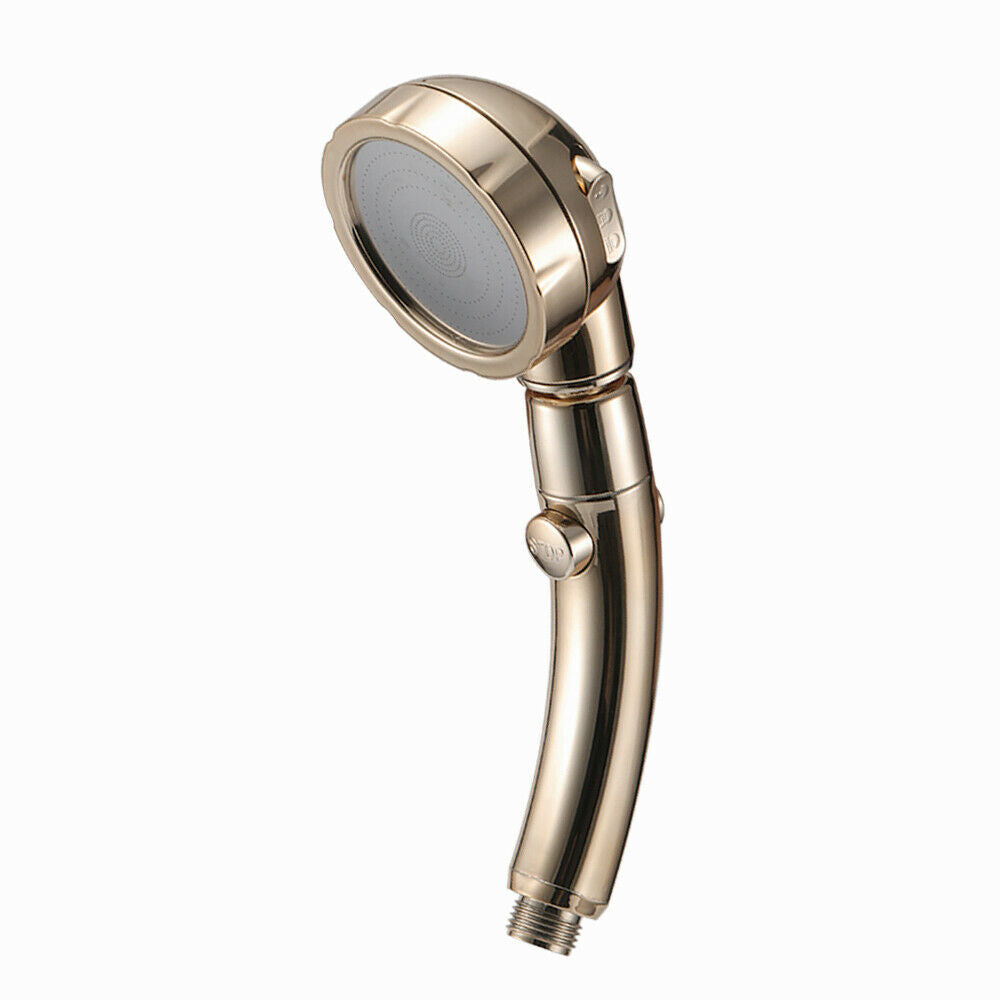 Teal Simba water-saving shower head with three modes in a sleek golden finish for bath and beauty use.