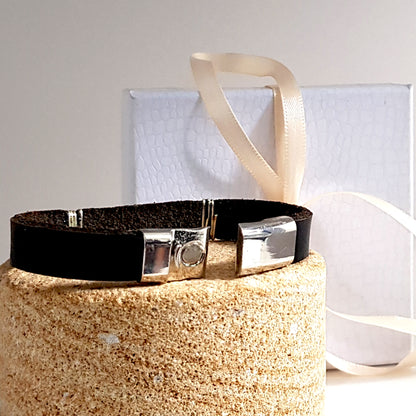 Large black leather and haematite band bracelet by Maroon Smudge, featuring bold leather and polished metal accents.