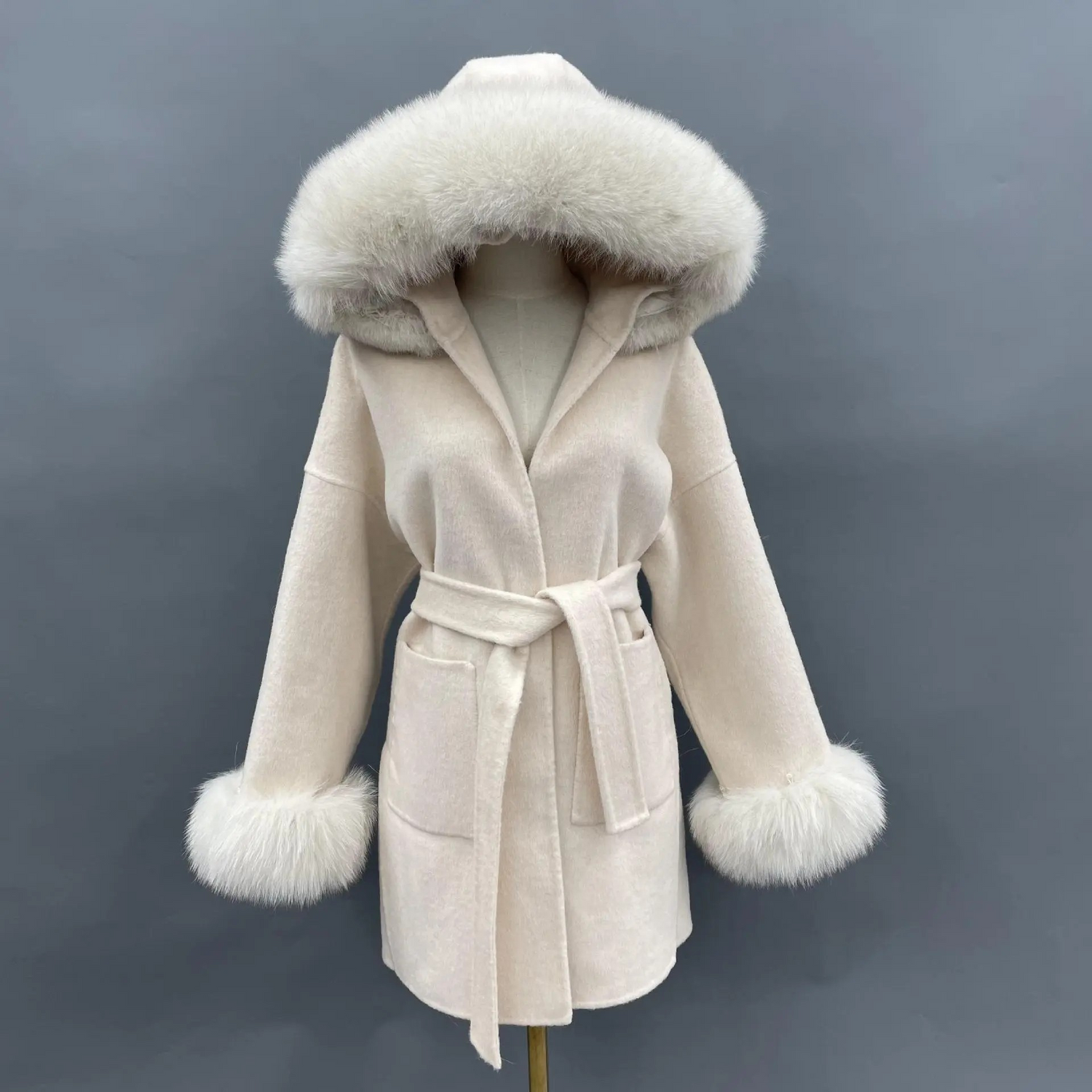 Carmine Juneberry oversized wool coat with double-sided fur collar and hood, showcasing luxurious warmth and stylish design.